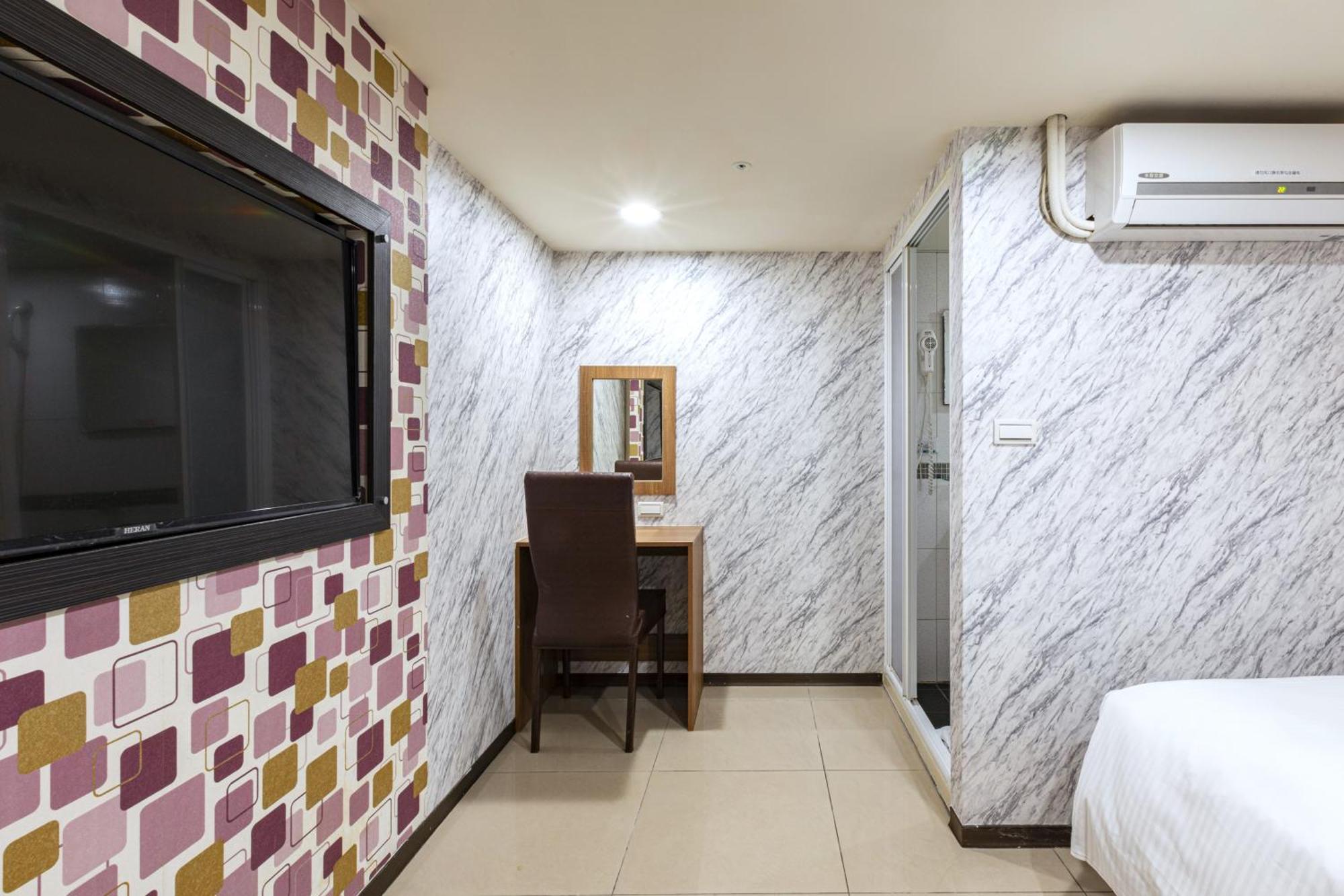 E Lim Hotel Zhongli Quarto foto