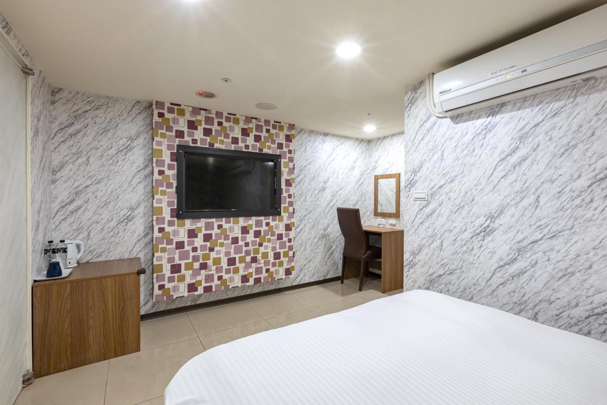 E Lim Hotel Zhongli Quarto foto