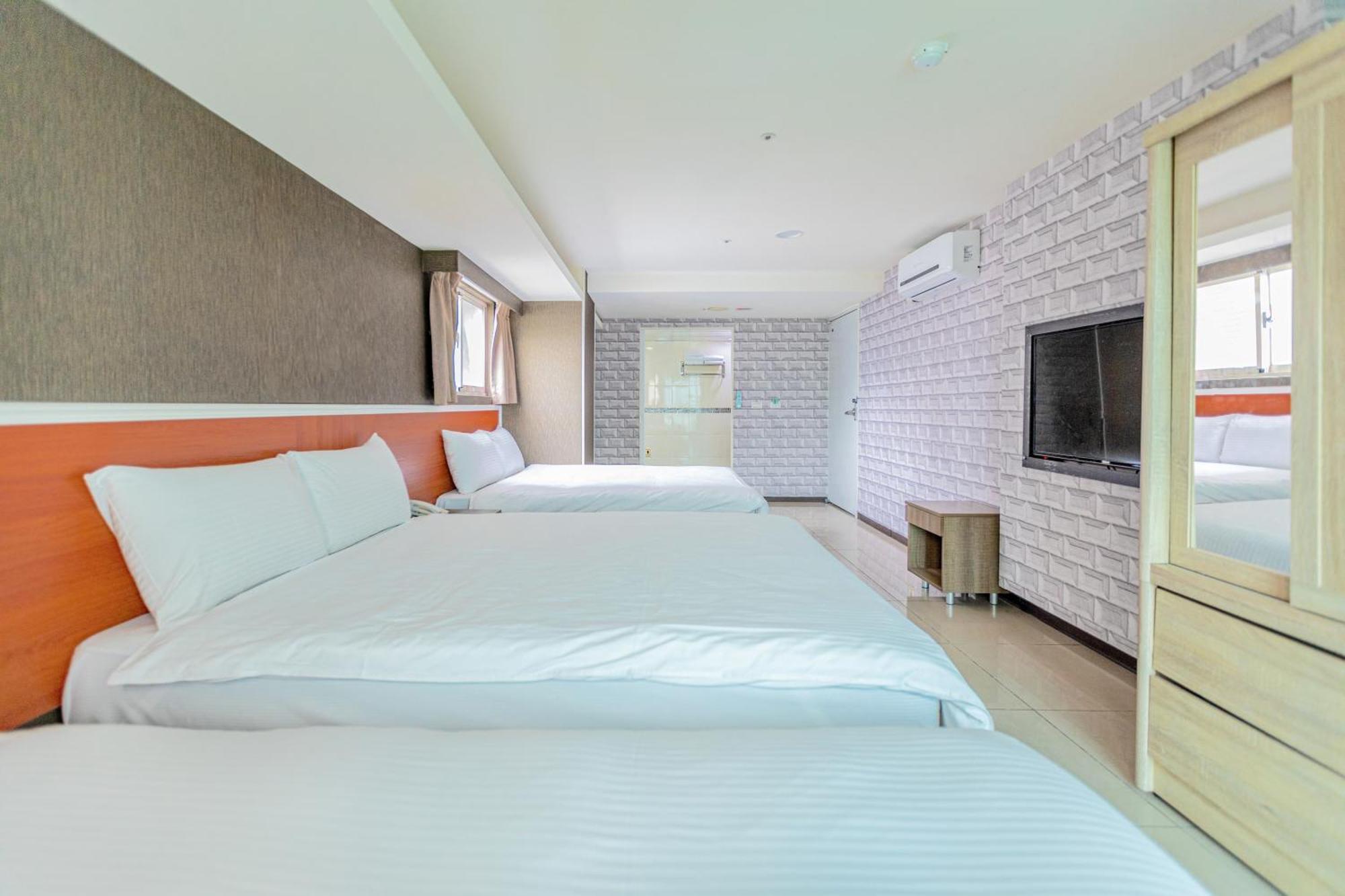 E Lim Hotel Zhongli Quarto foto