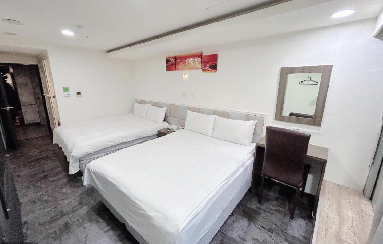 E Lim Hotel Zhongli Quarto foto